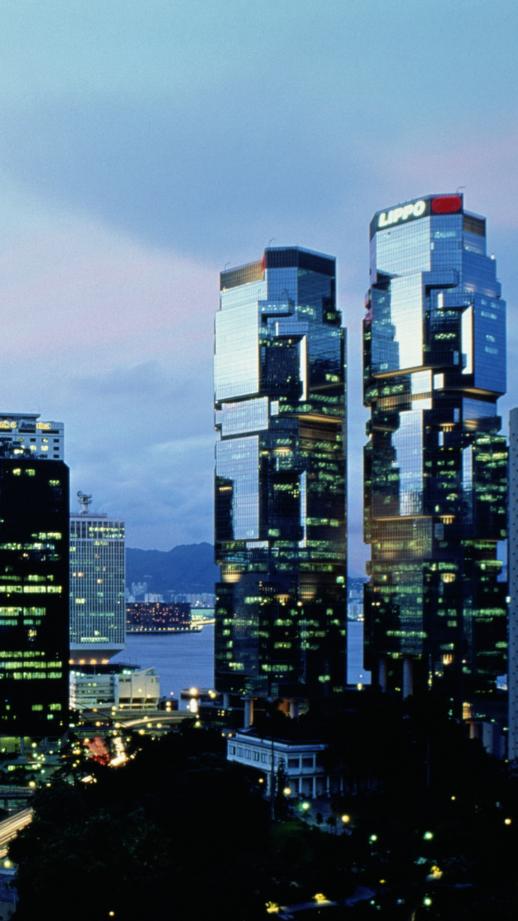 Обои город, метрополия, городской пейзаж, городской район, небоскреб в разрешении 750x1334