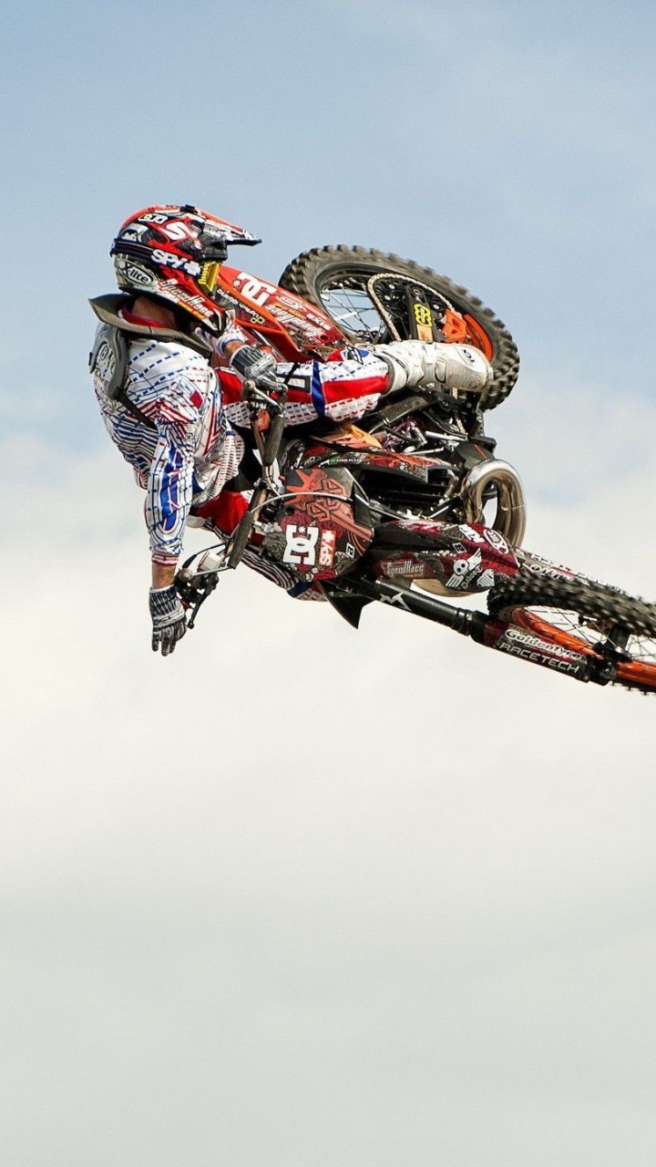 Обои мотокросс, Фристайл мотокросс, каскадер, гонки на мотоциклах, экстремальный вид спорта в разрешении 720x1280