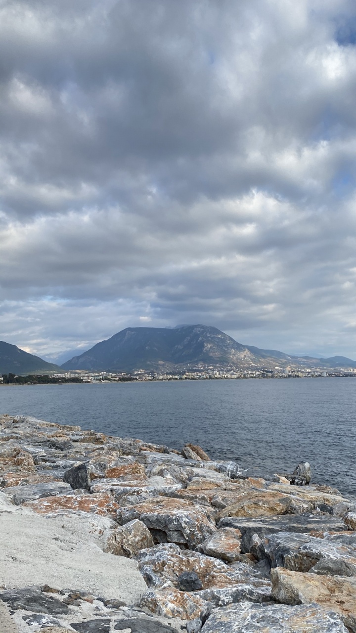 Обои море, облако, вода, гидроресурсы, гора в разрешении 720x1280