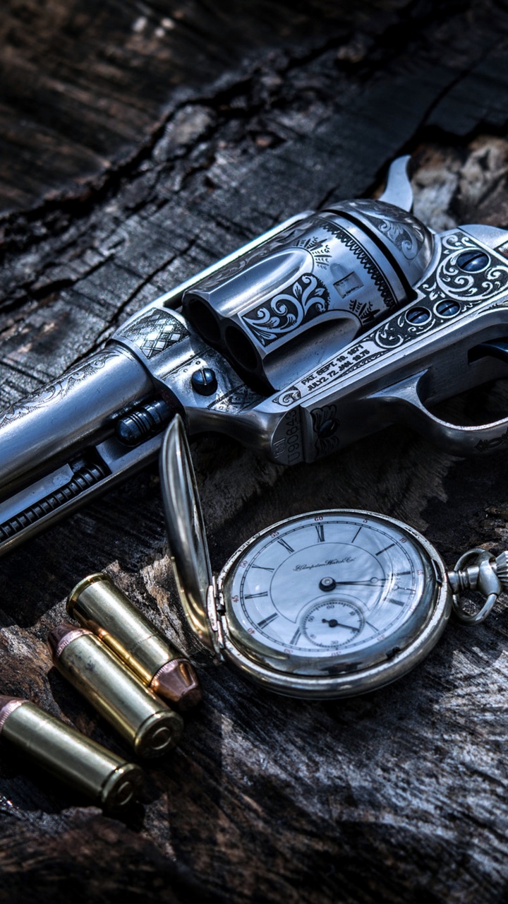 Обои орудие, огнестрельное оружие, револьвер, триггер, ствол в разрешении 720x1280