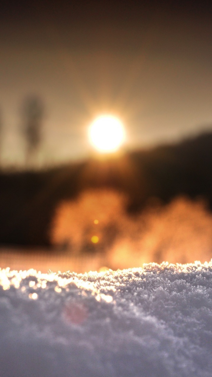 Обои снег, вода, зима, волна, солнечный свет в разрешении 720x1280