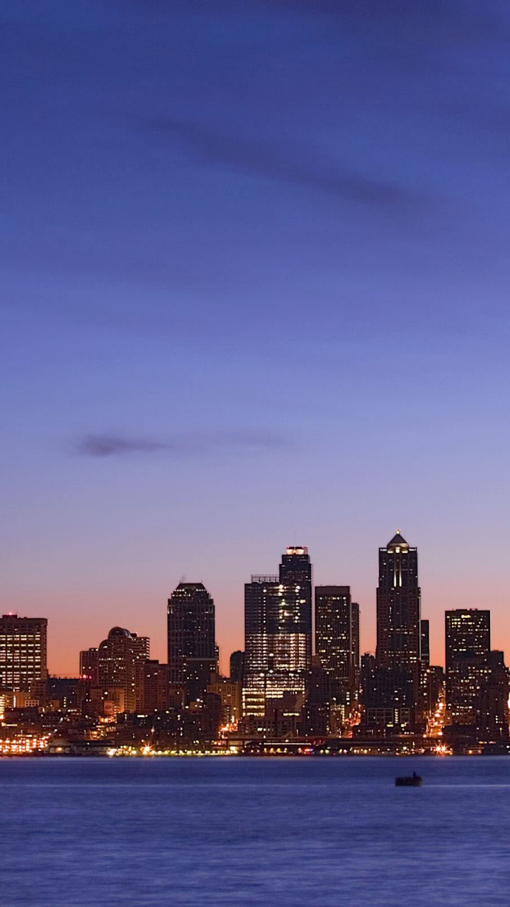 Обои город, городской пейзаж, линия горизонта, дневное время, небоскреб в разрешении 720x1280