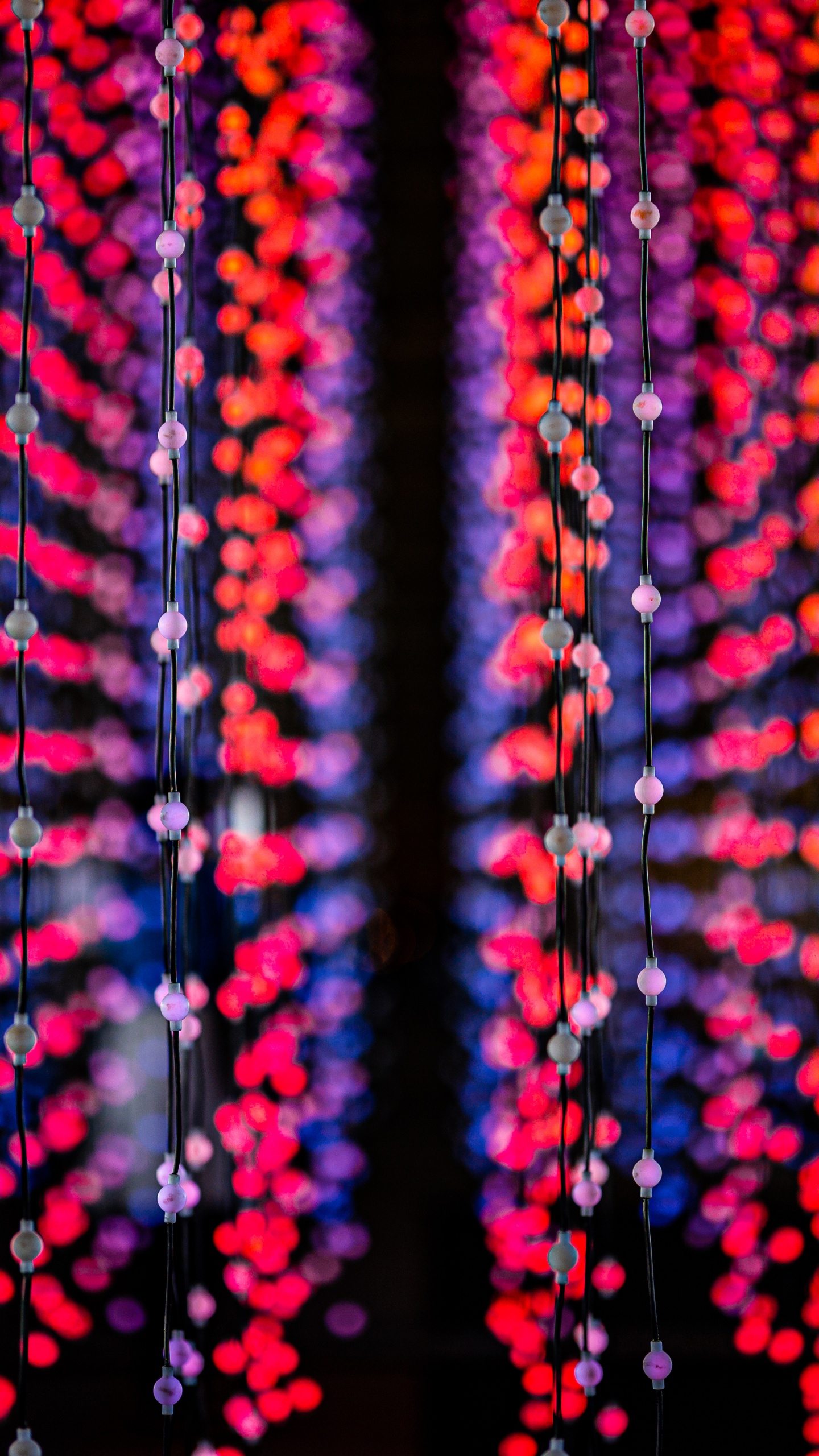 Обои свет, узор, пурпурный цвет, симметрия, боке в разрешении 1440x2560