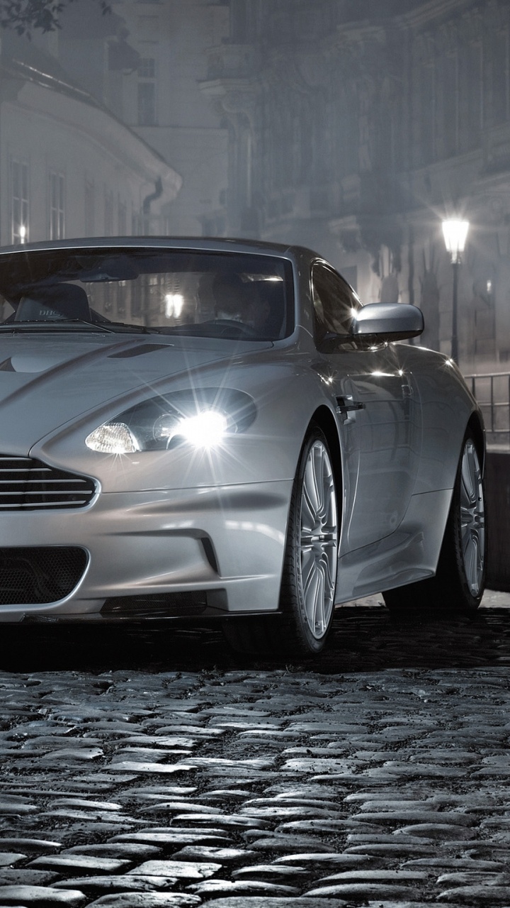 Обои автомобиль, суперкар, черный, aston martin vantage в разрешении 720x1280