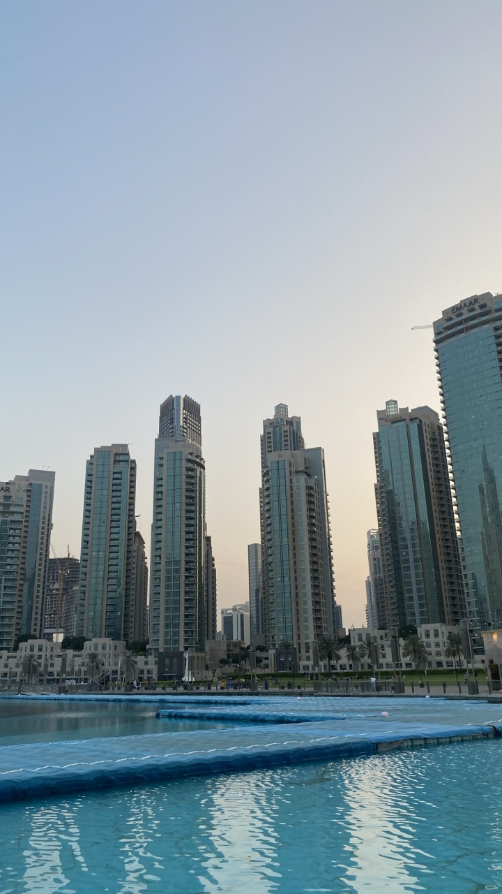 Обои Дубай, небоскреб, вода, синий, башня в разрешении 720x1280