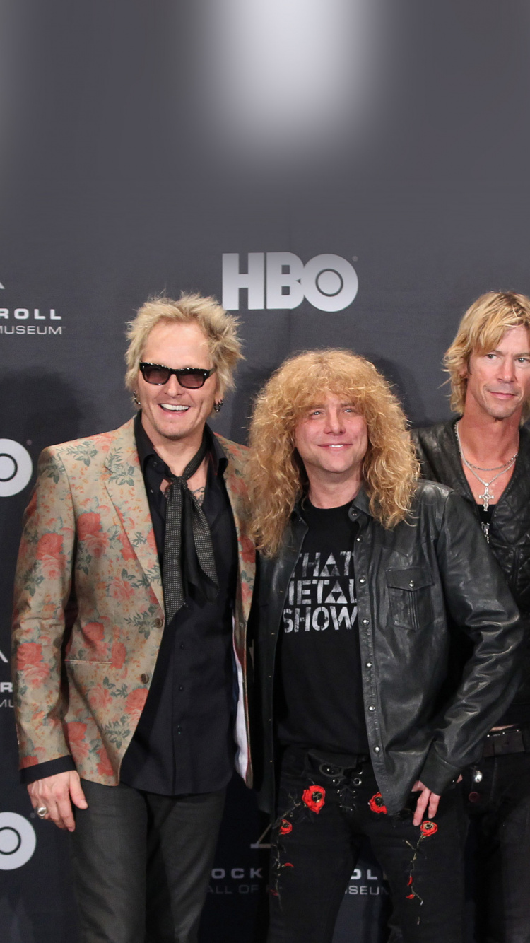 Обои Слэш, Дафф Маккаган, Guns N Roses, тяжелый рок, фэшн в разрешении 750x1334