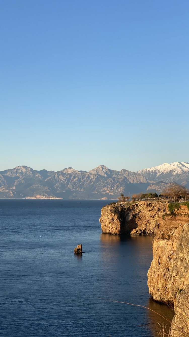 Обои море, вода, гора, гидроресурсы, лазурный в разрешении 750x1334