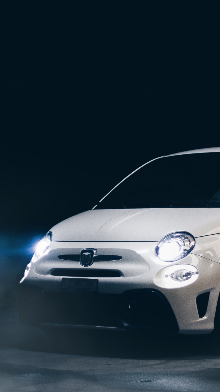 Обои городской автомобиль, Литые диски, автомобильное освещение, обод, фара в разрешении 720x1280