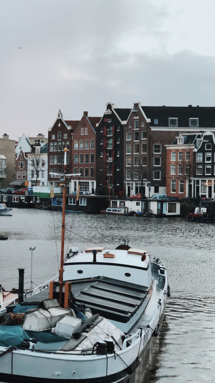 Обои вода, лодка, перевозка воды, катание на лодках, водоем в разрешении 720x1280