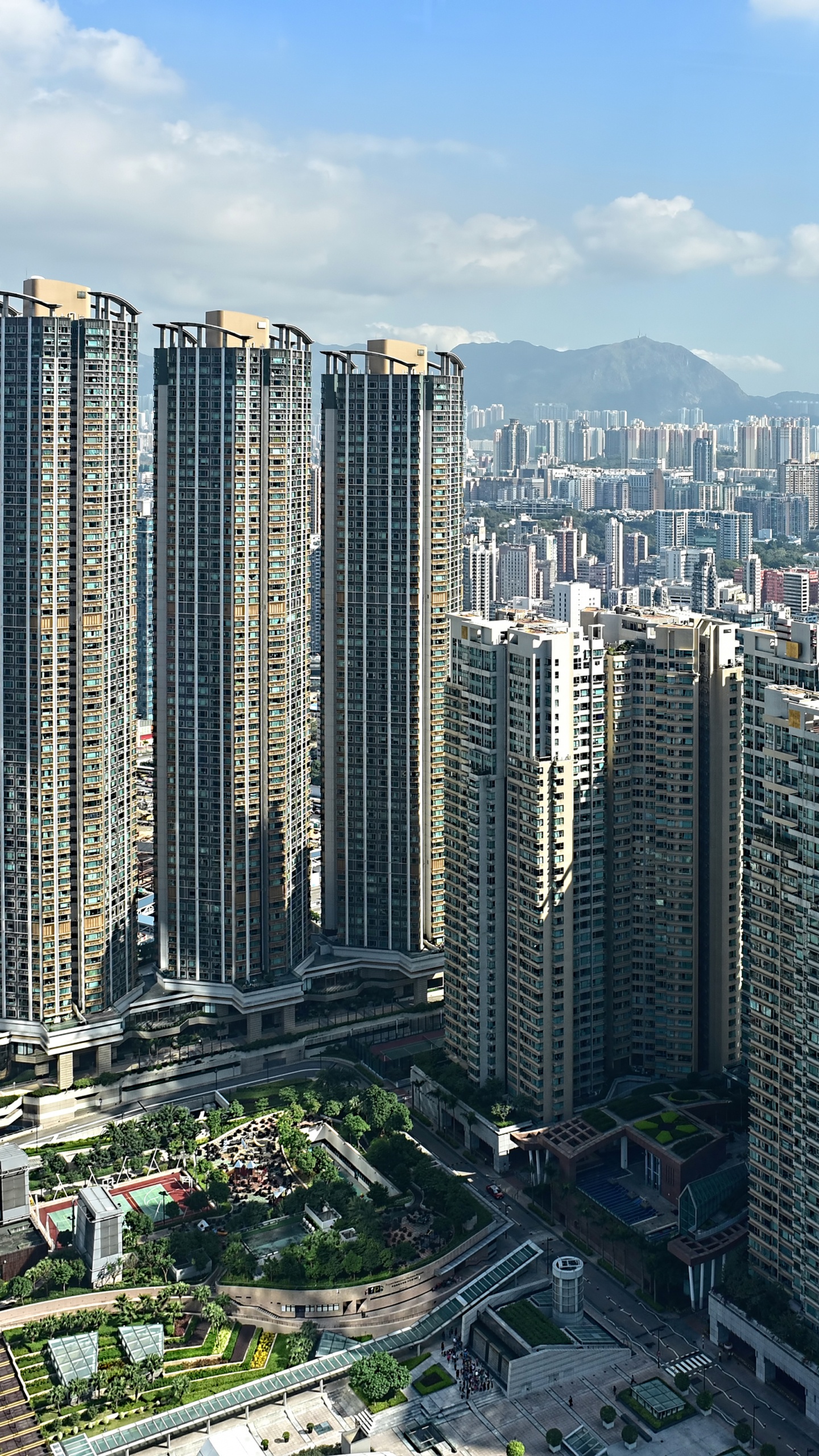 Обои Гонконг, небоскреб, городской район, город, метрополия в разрешении 1440x2560