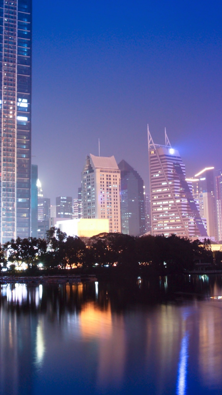 Обои город, городской пейзаж, метрополия, линия горизонта, отражение в разрешении 720x1280