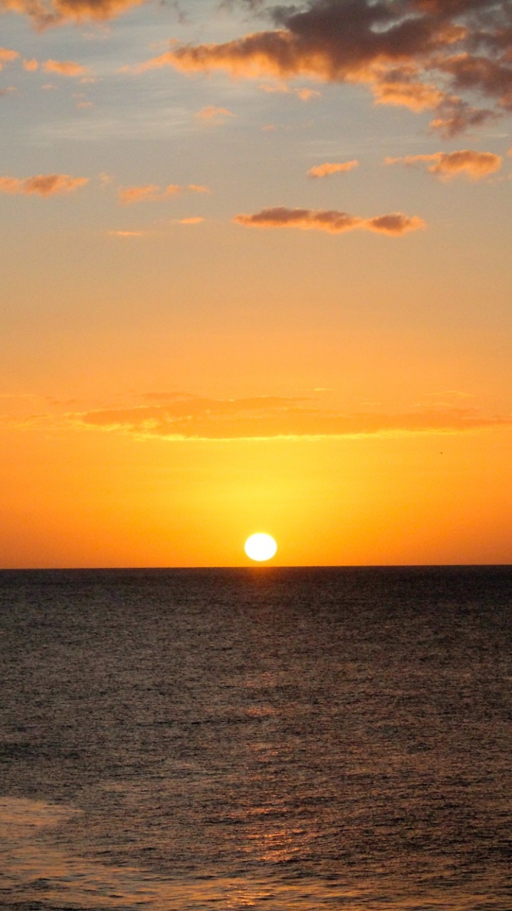 Обои горизонт, закат, море, послесвечение, восход солнца в разрешении 720x1280