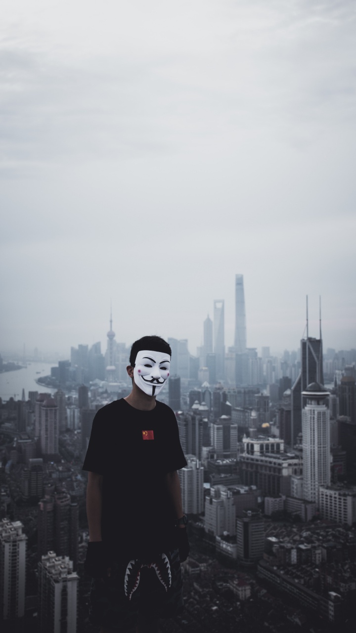Обои Гая Фокса маска, городской район, белые, метрополия, город в разрешении 720x1280