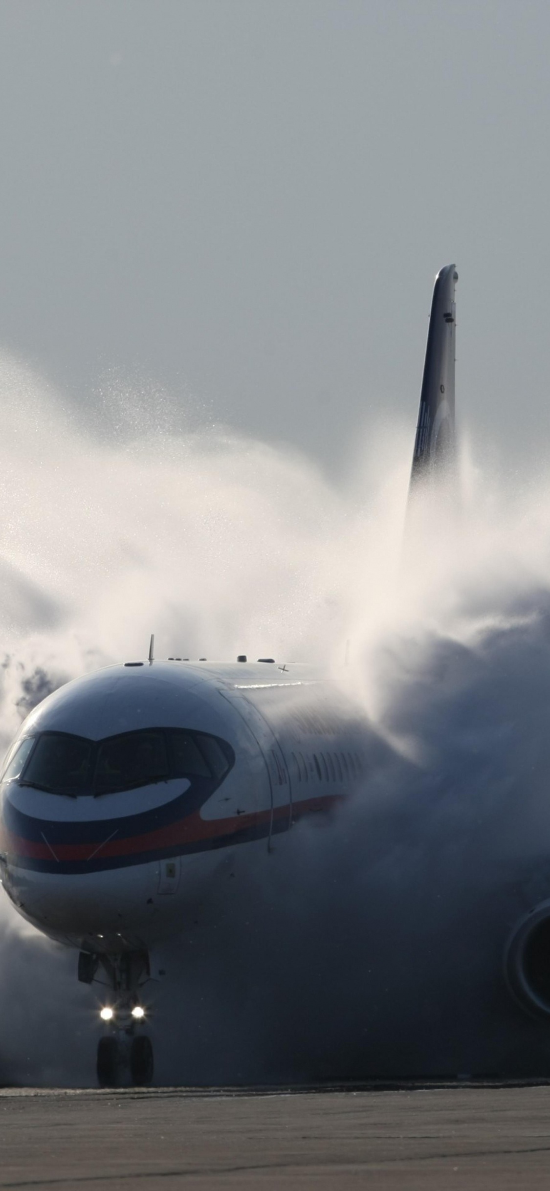 Обои самолет, самолеты, полет, Сухой Суперджет 100, авиация в разрешении 1125x2436