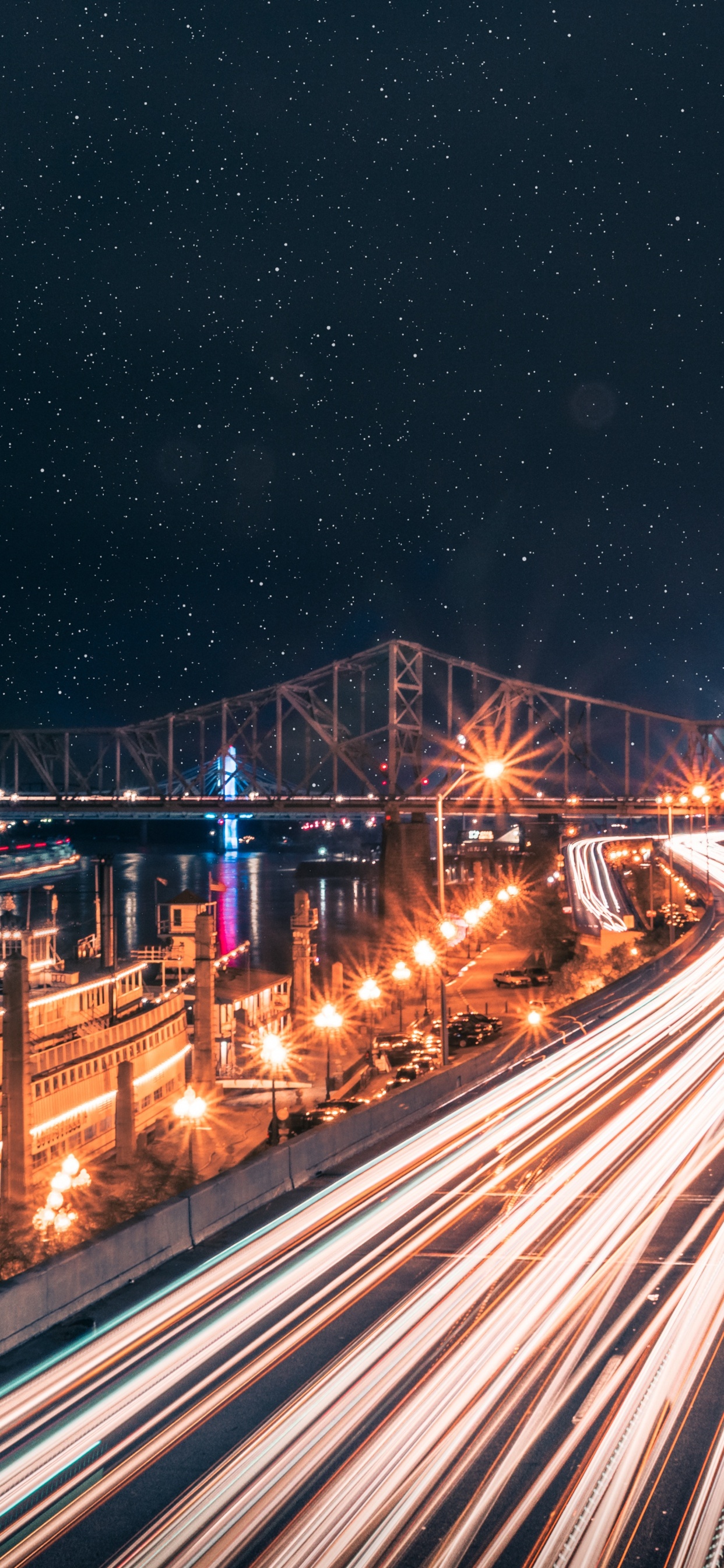 Обои ночь, свет, ориентир, город, городской район в разрешении 1242x2688