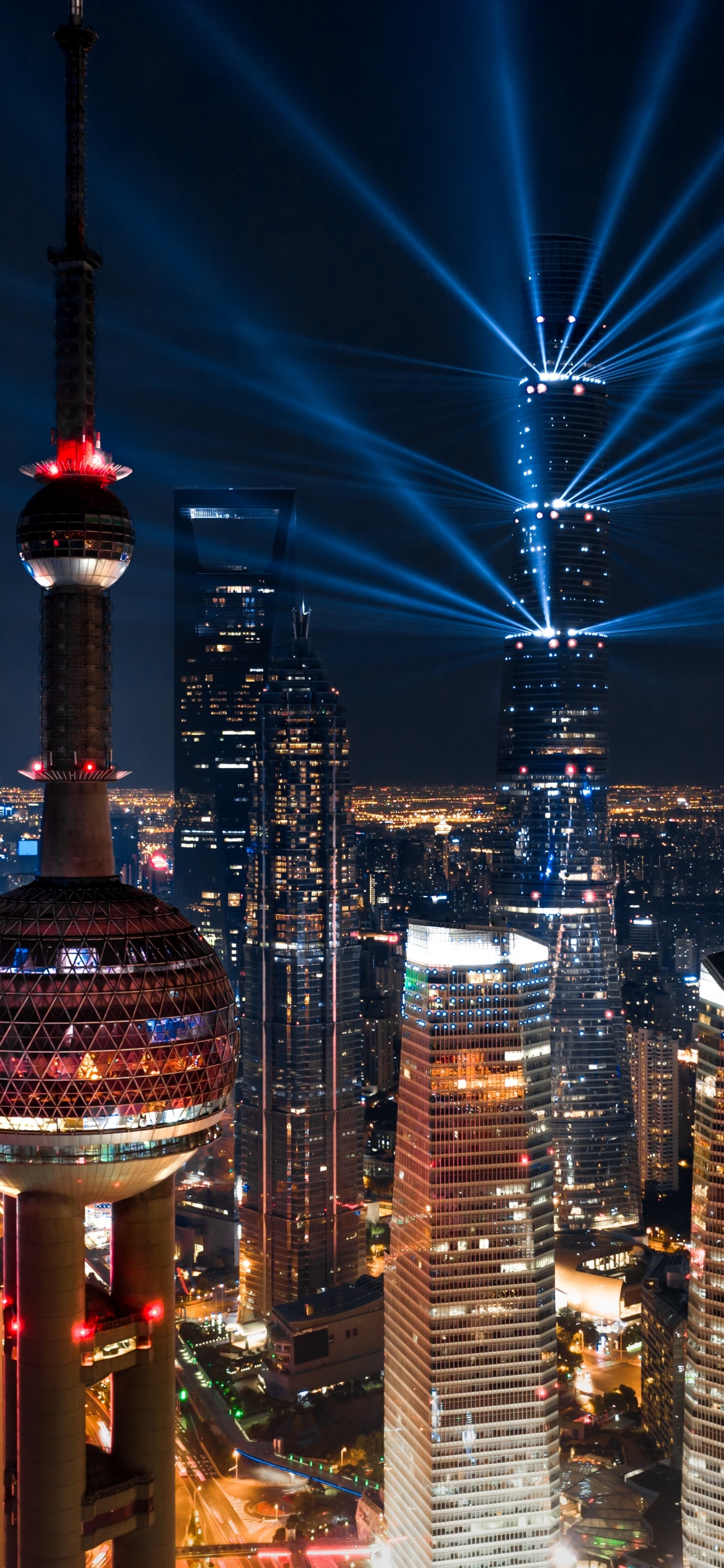 Обои город, городской пейзаж, городской район, ночь, метрополия в разрешении 1125x2436