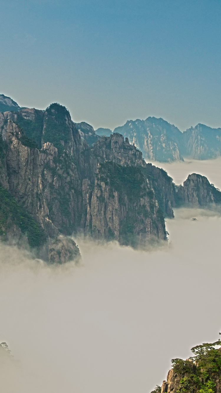 Обои Горы Хуаншань, достопримечательность, горный хребет, гора, природа в разрешении 750x1334