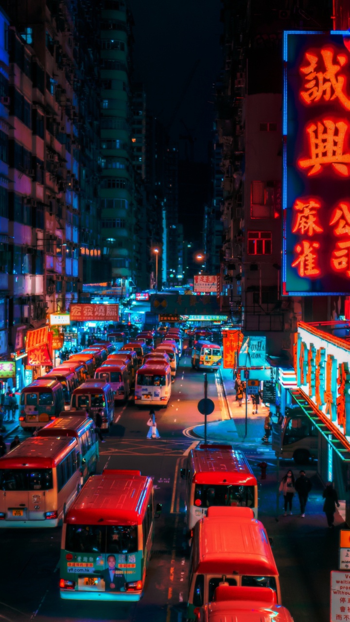 Обои легковые автомобили, здание, автомобильное освещение, свет, небоскреб в разрешении 720x1280