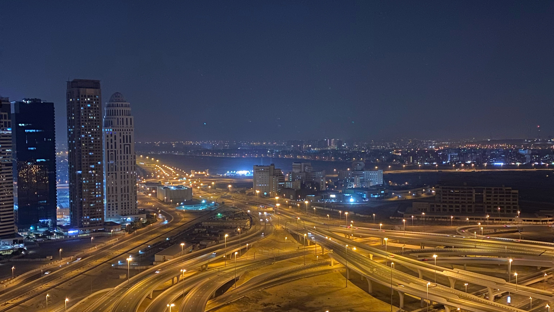 Обои Дубай, дорога, ночь, городской район, город в разрешении 1920x1080