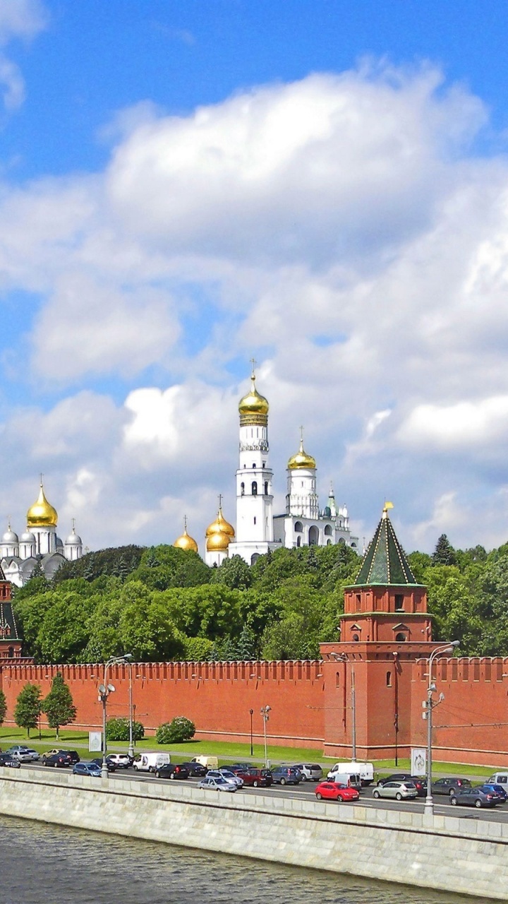 Обои ориентир, облако, город, дневное время, небо в разрешении 720x1280