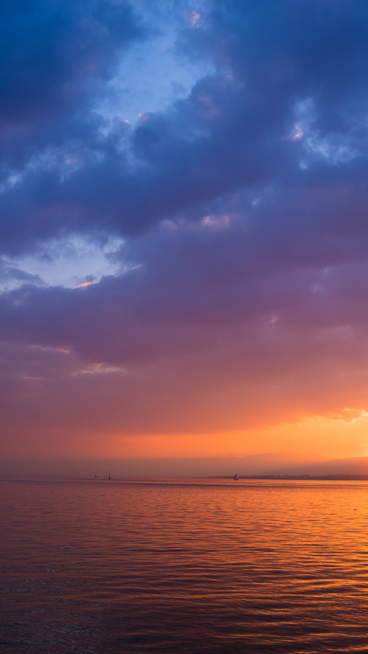 Обои закат, ios, облако, вода, атмосфера в разрешении 720x1280