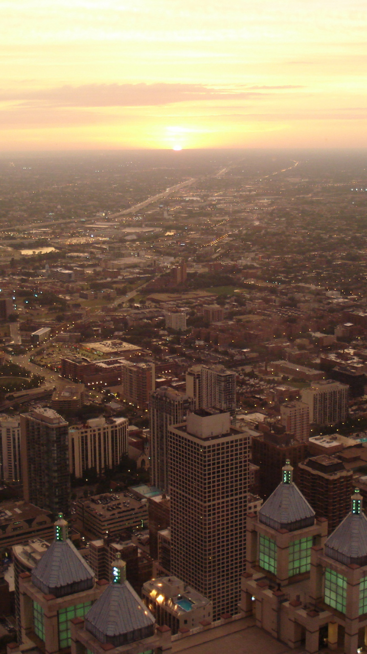 Обои городской пейзаж, дневное время, закат, небоскреб, городской район в разрешении 750x1334