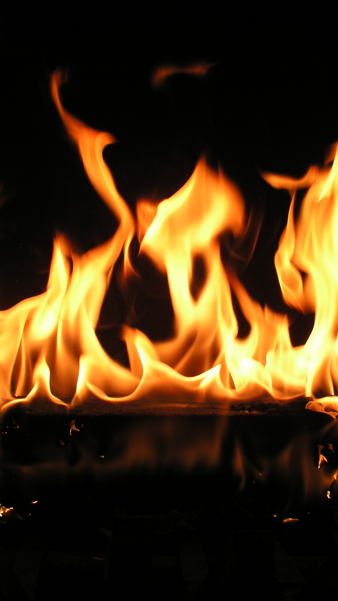 Обои пламя, огонь, тепло, темнота, костер в разрешении 1080x1920
