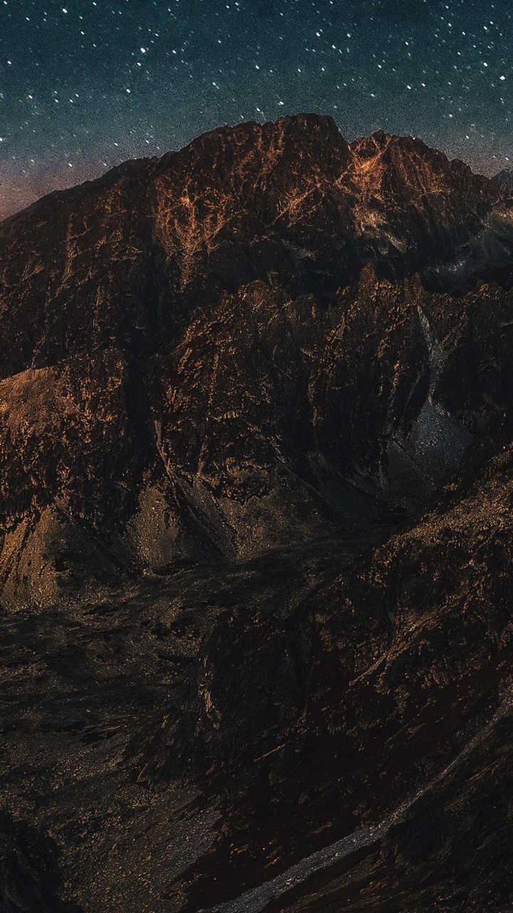 Обои горный рельеф, гора, горный хребет, атмосфера, космос в разрешении 720x1280