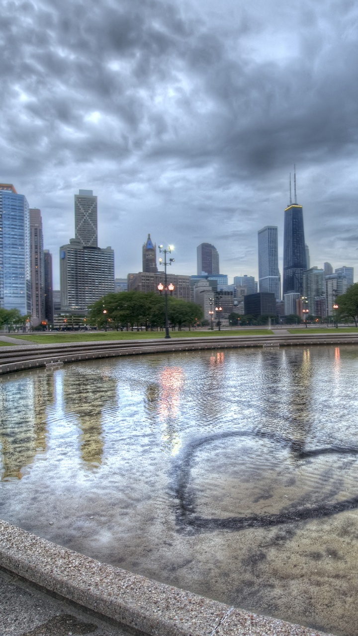 Обои линия горизонта, дневное время, вода, отражение, город в разрешении 720x1280