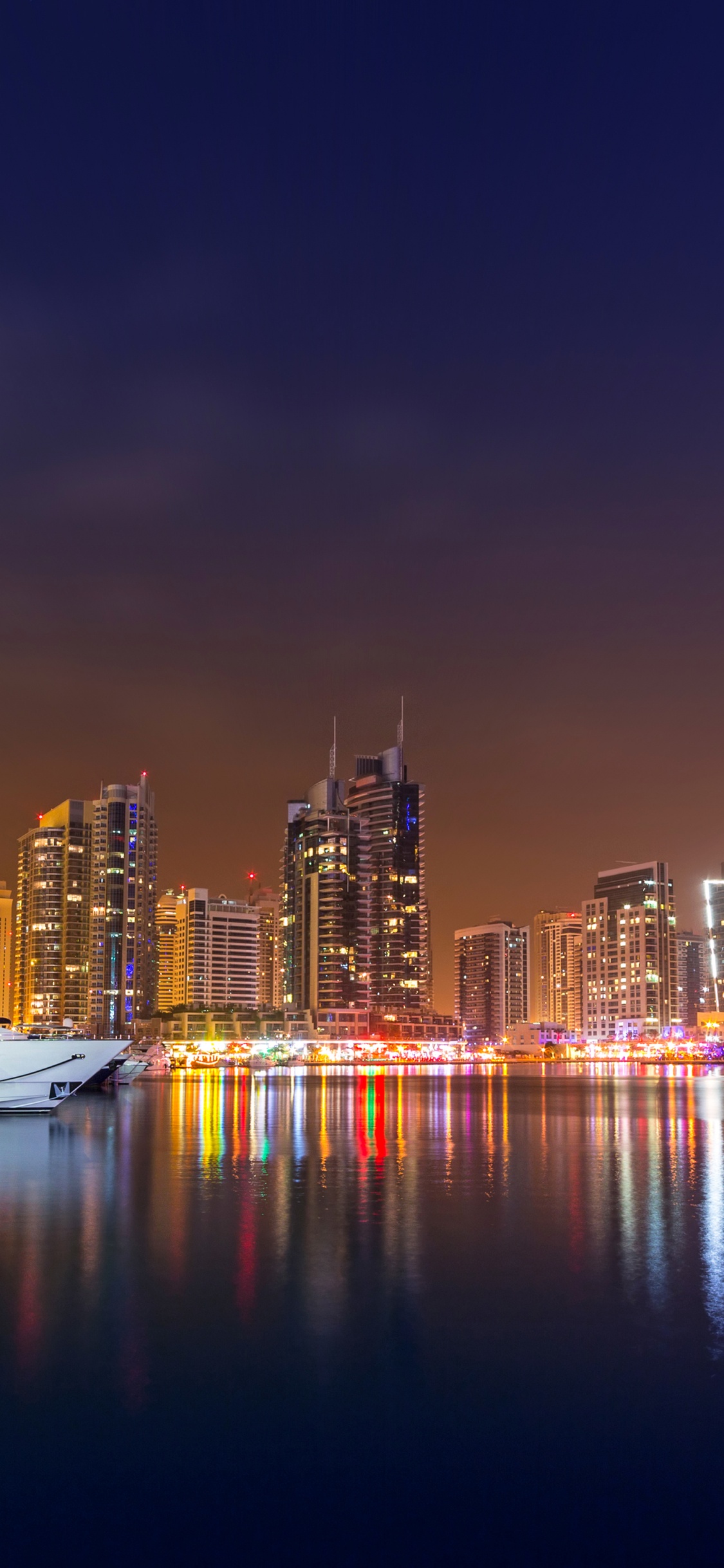 Обои канун Нового года, Новый год, городской пейзаж, город, линия горизонта в разрешении 1125x2436