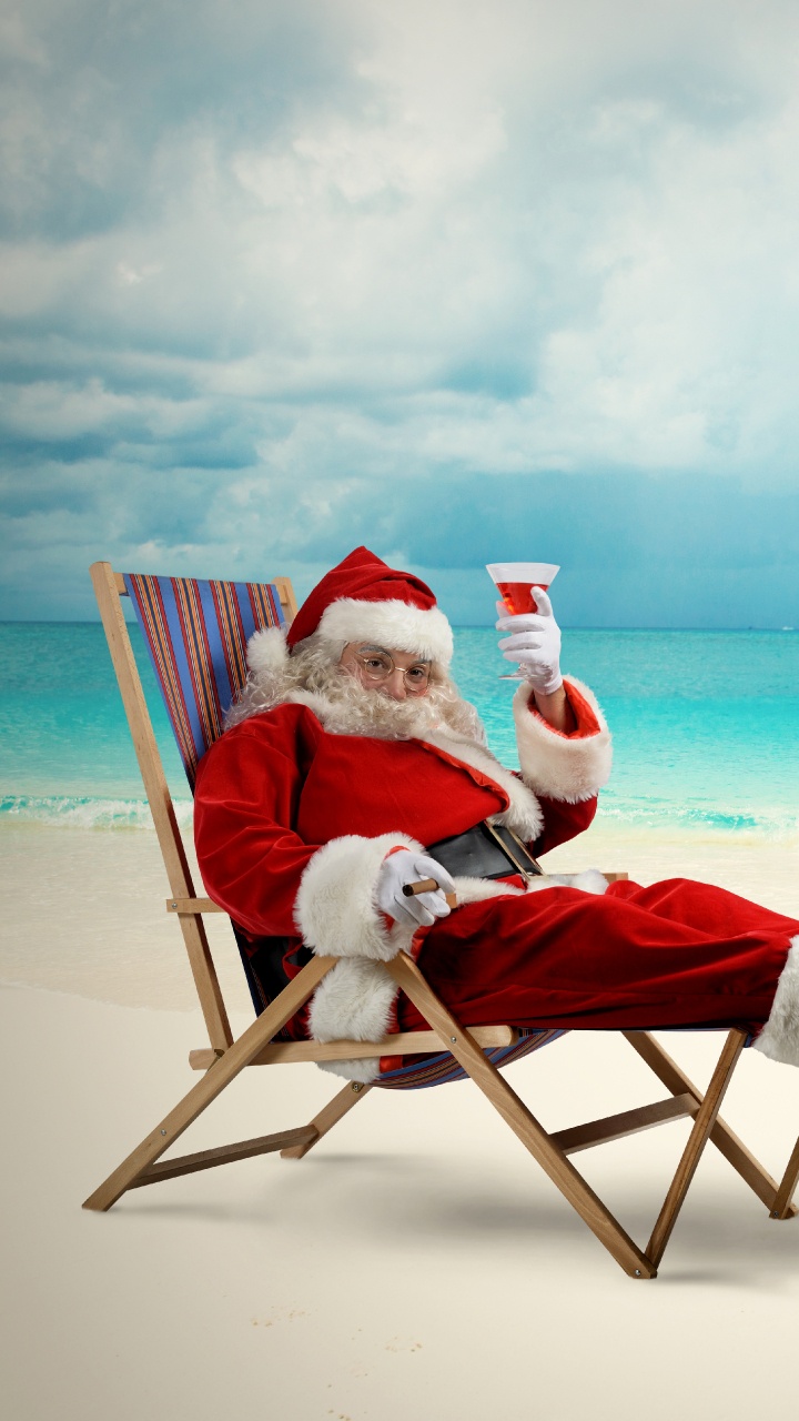 Обои Санта-Клаус, Рождественский день, пляж, море, отпуск в разрешении 720x1280