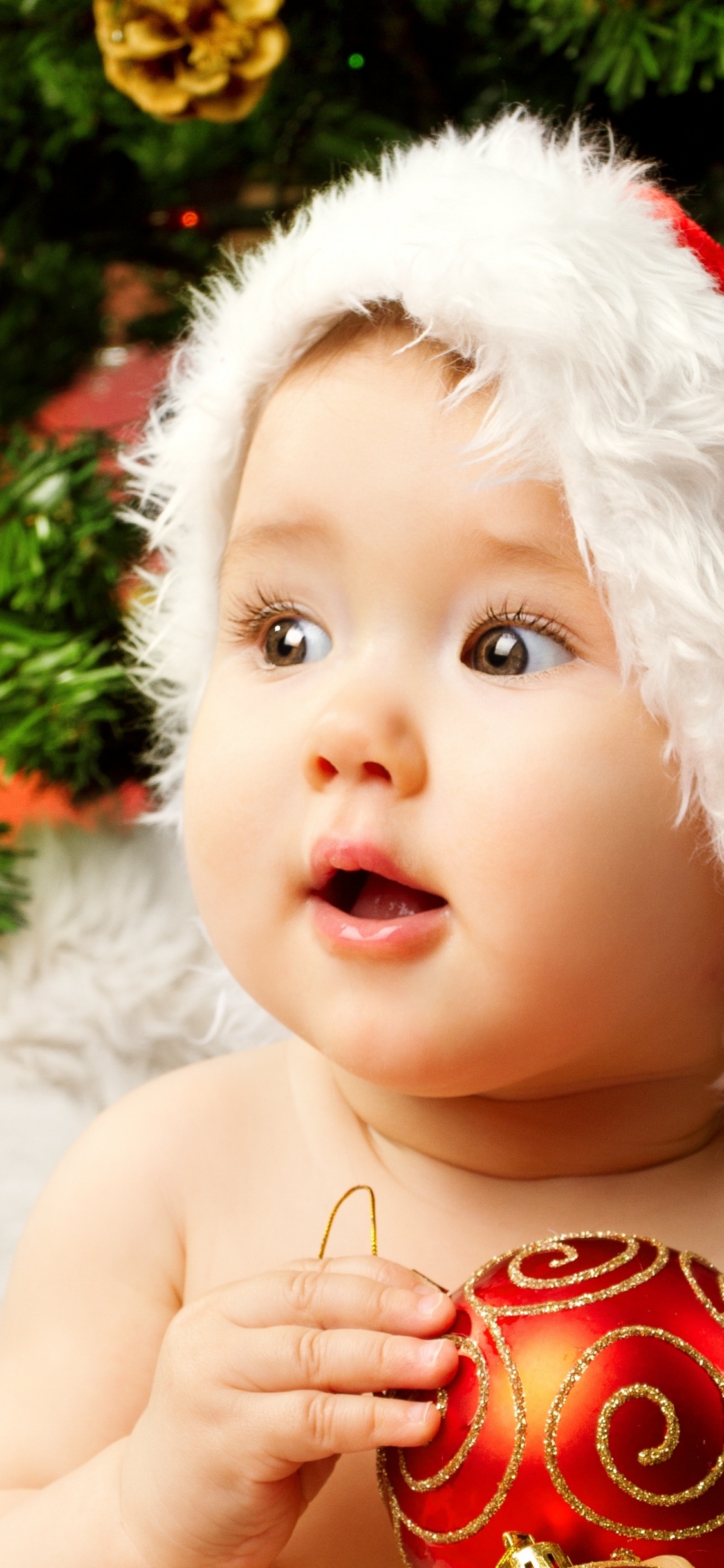 Обои Рождественский день, младенец, привлекательность, Рождество, ребенок в разрешении 1125x2436