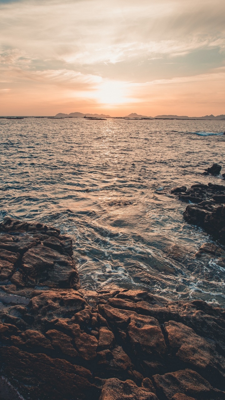 Обои море, закат, горизонт, природа, рок в разрешении 720x1280