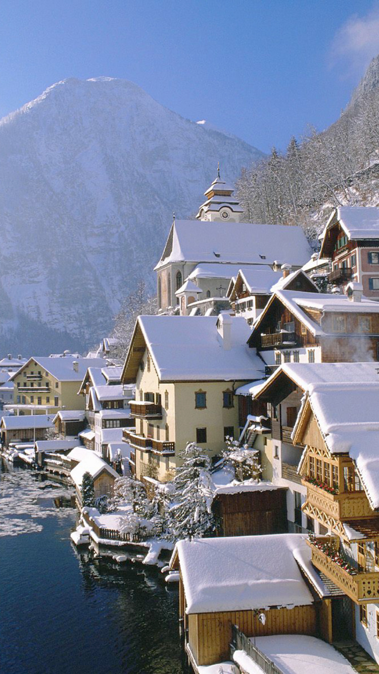 Обои гальштат, зима, горная деревня, гора, горный хребет в разрешении 750x1334
