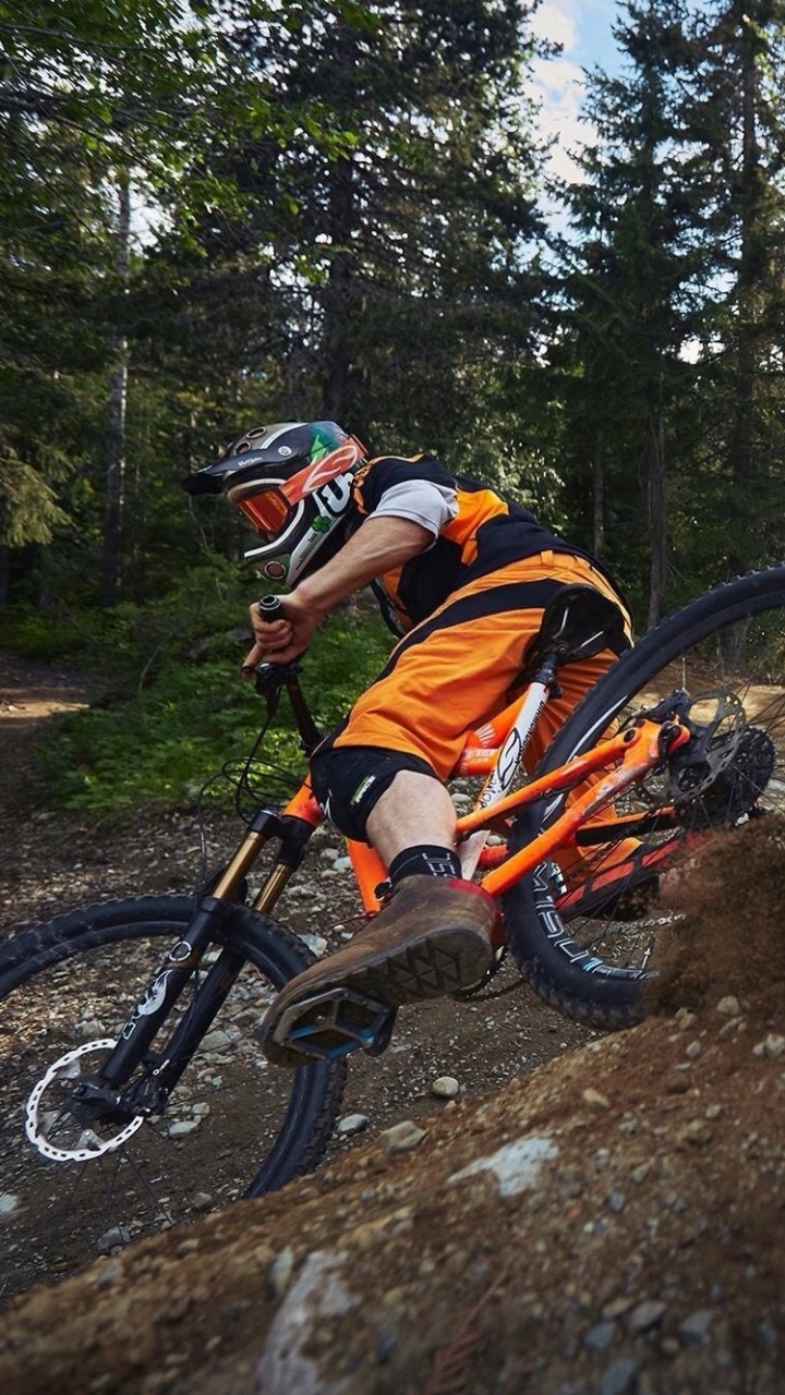 Обои велосипед, горный велосипед, горный спуск на велосипедах, занятие спортом, велосипедный спорт в разрешении 720x1280