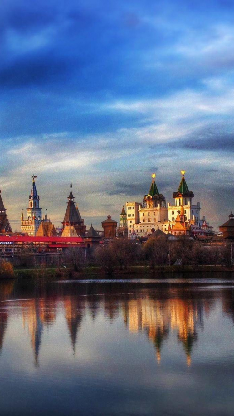 Обои serebriano-виноградний пруд, отражение, ориентир, облако, сумрак в разрешении 750x1334