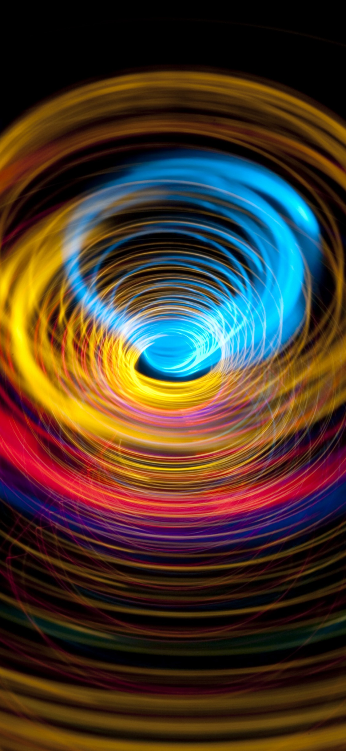 Обои круг, вращение, свет, красочность, вихрь в разрешении 1125x2436