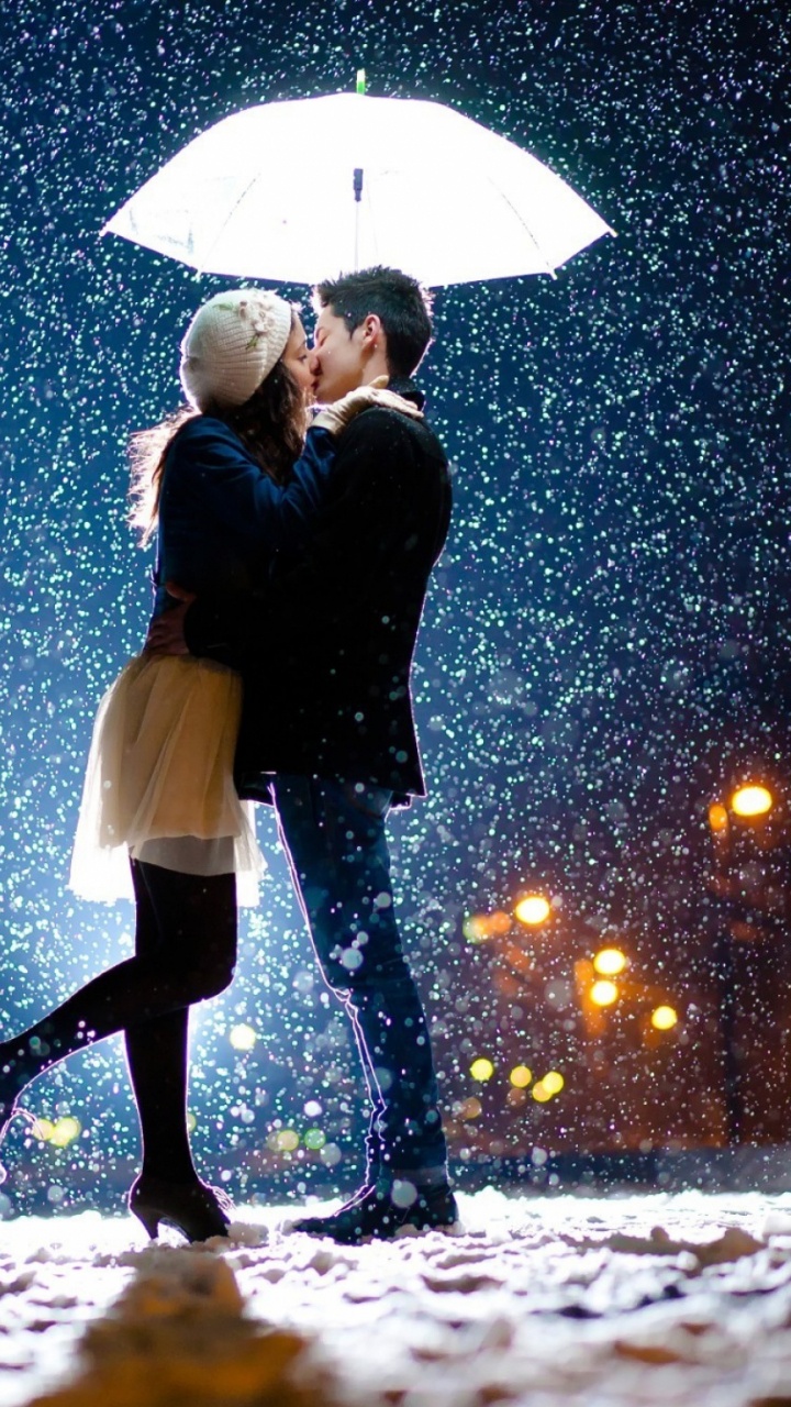 Обои роман, поцелуй, пара, снег, любовь в разрешении 720x1280