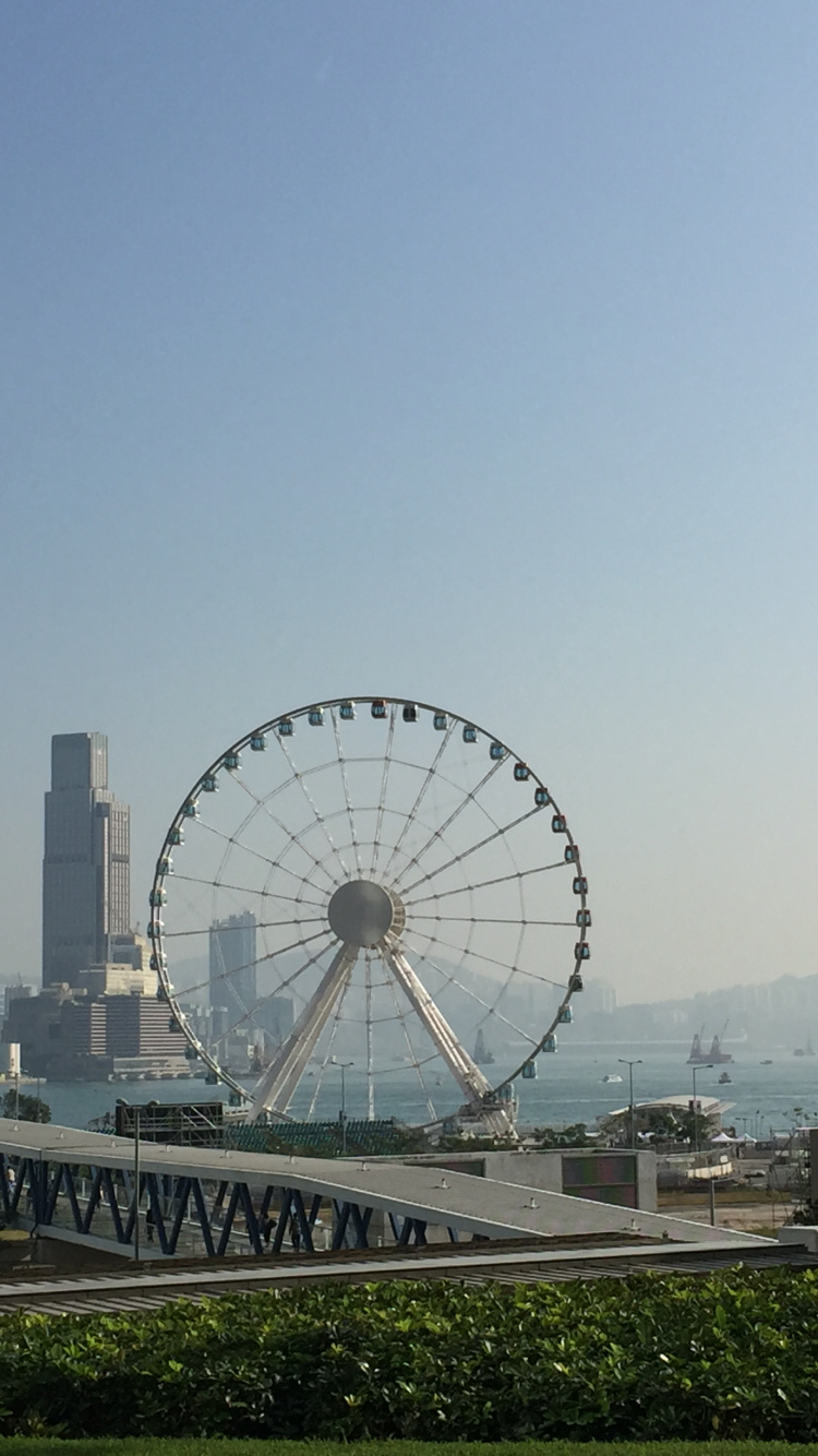 Обои колесо обозрения, природа, дневное время, архитектура, городской район в разрешении 750x1334