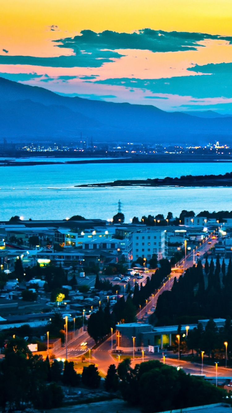 Обои природа, вода, вечер, город, горизонт в разрешении 750x1334