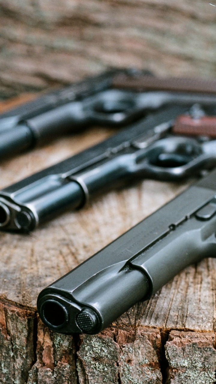 Обои пистолет м1911, орудие, ручное огнестрельное оружие, огнестрельное оружие, триггер в разрешении 720x1280