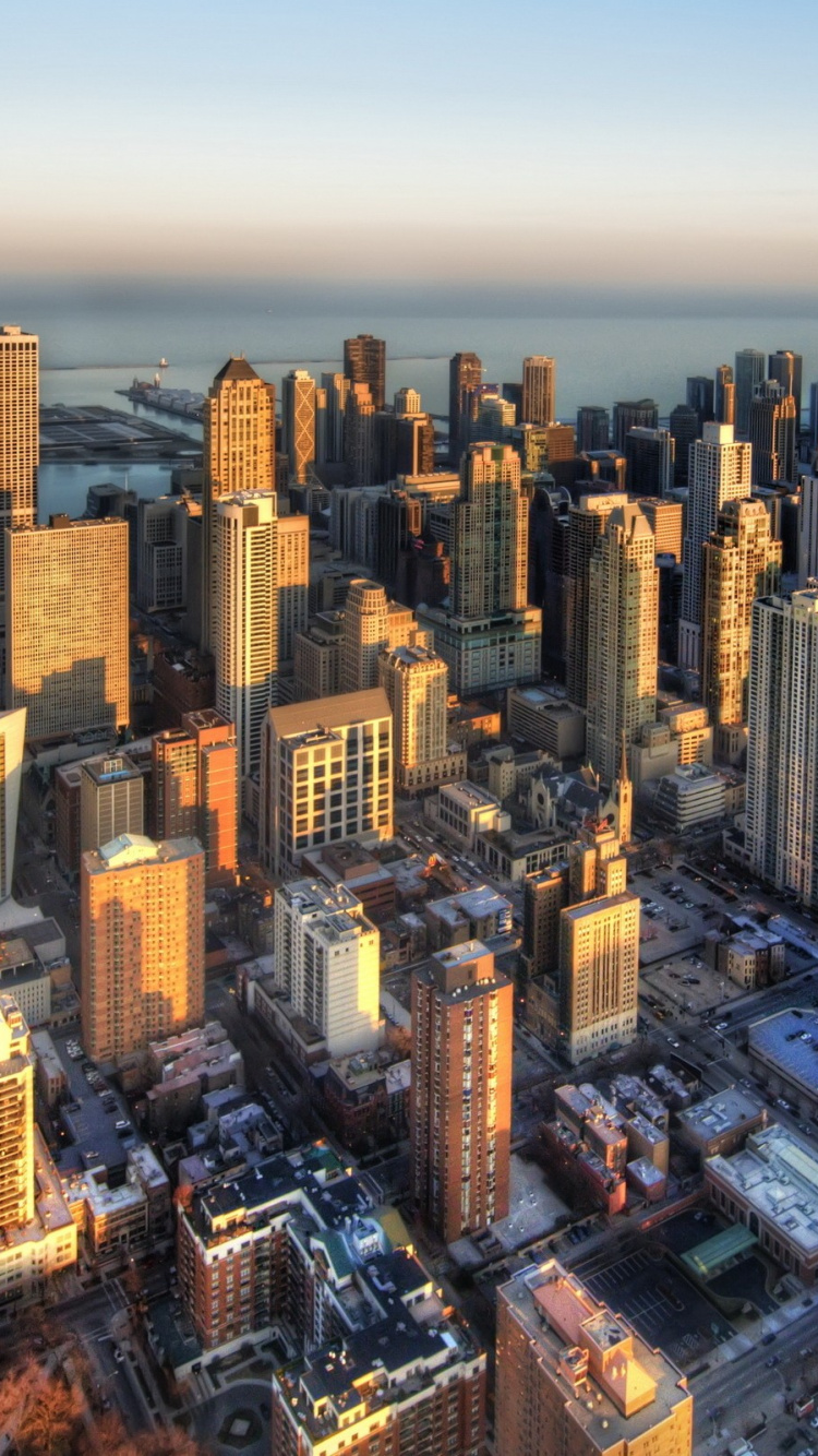 Обои здание, небоскреб, город, городской пейзаж, городской район в разрешении 750x1334