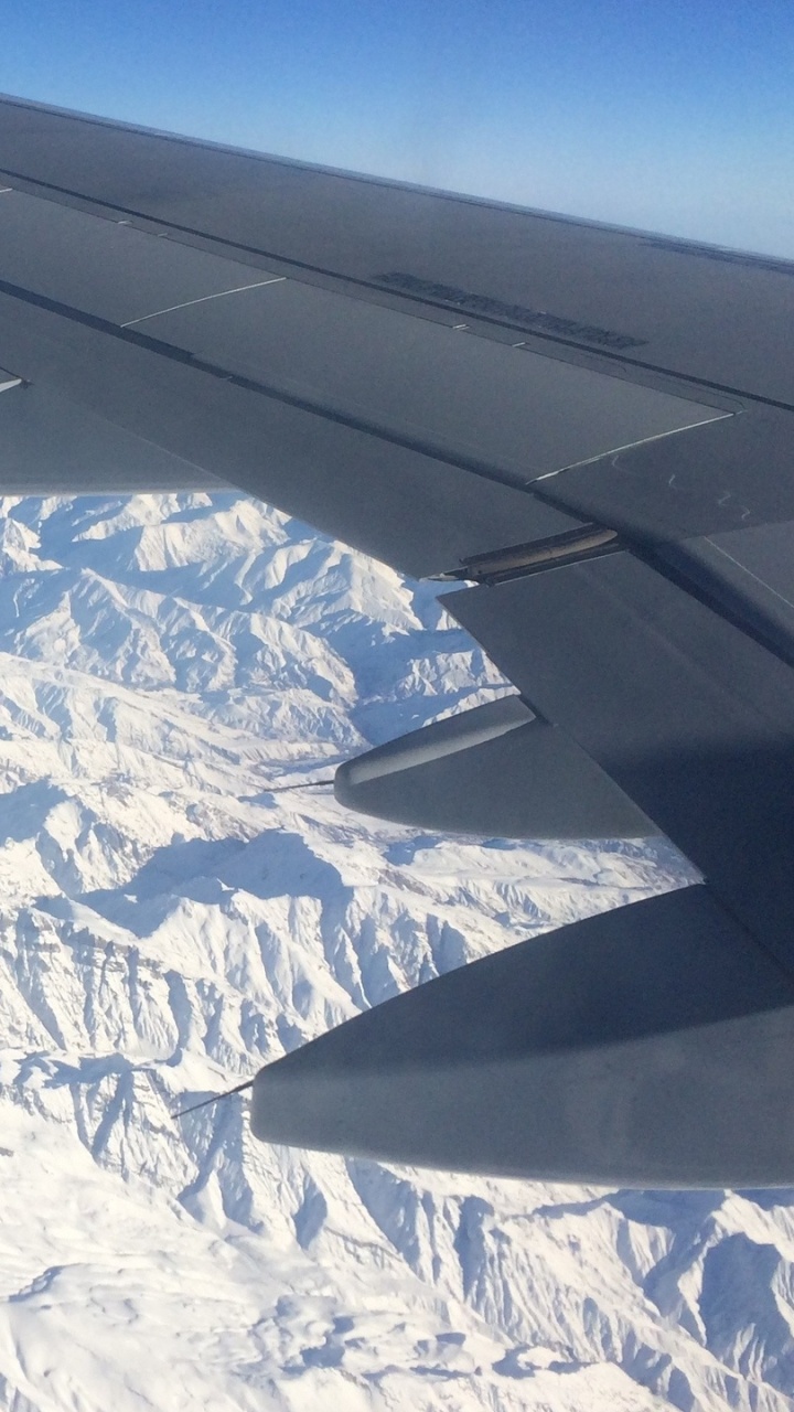 Обои самолет, полет, воздушное путешествие, авиалайнер, авиация в разрешении 720x1280