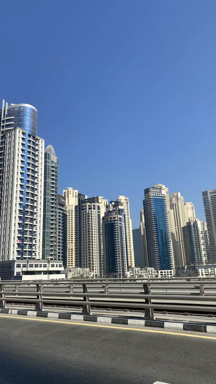 Обои Дубай, башня, дневное время, город, свойство в разрешении 750x1334