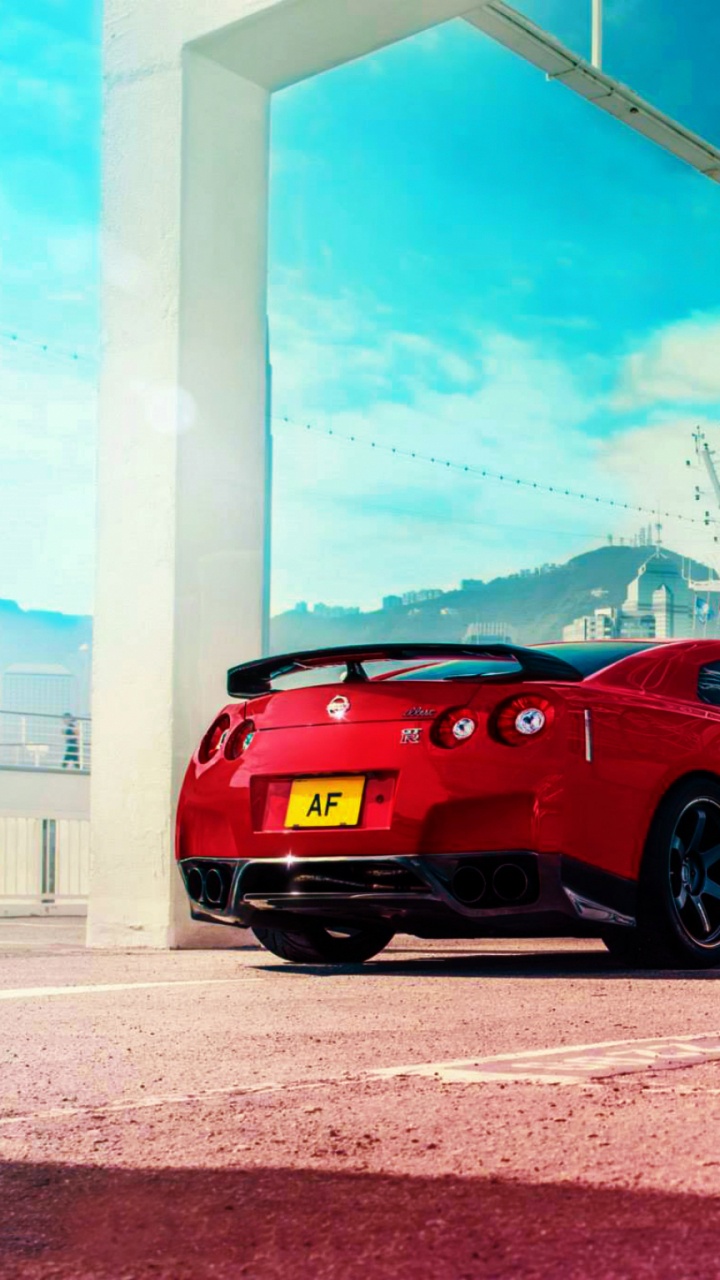 Обои спорткар, Ниссан, суперкар, красный цвет, колесо в разрешении 720x1280