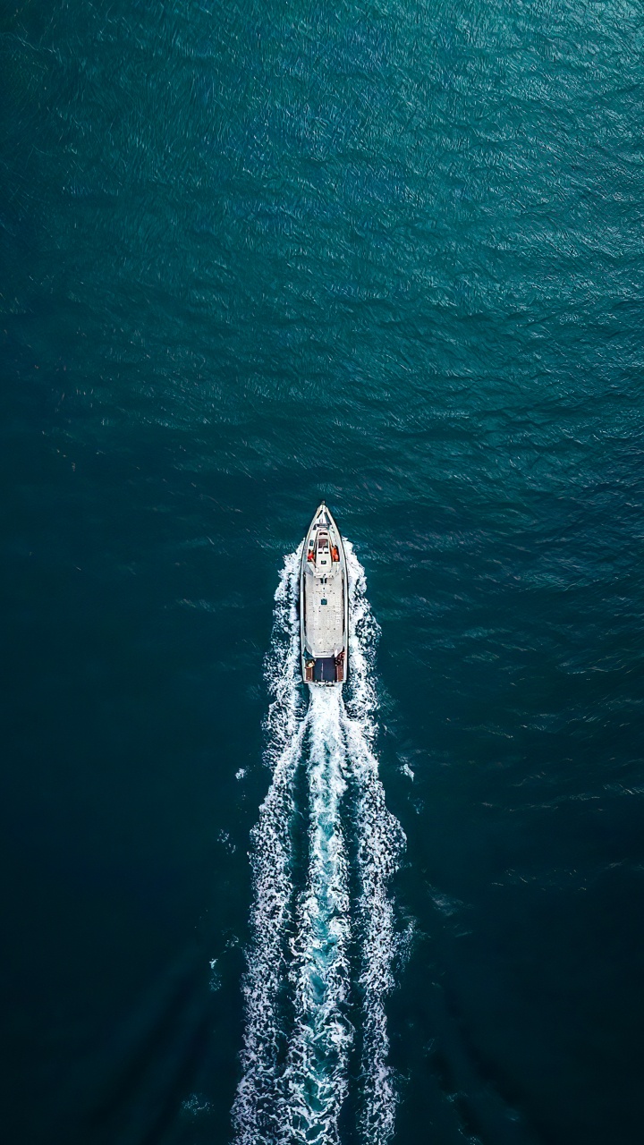 Обои море, вода, лодка, судно, лазурный в разрешении 720x1280