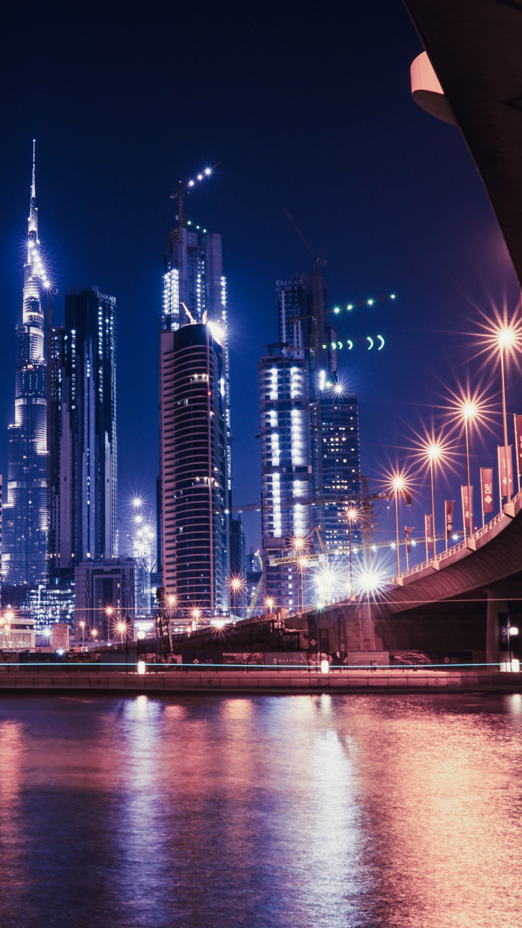 Обои городской пейзаж, город, ночь, городской район, отражение в разрешении 750x1334