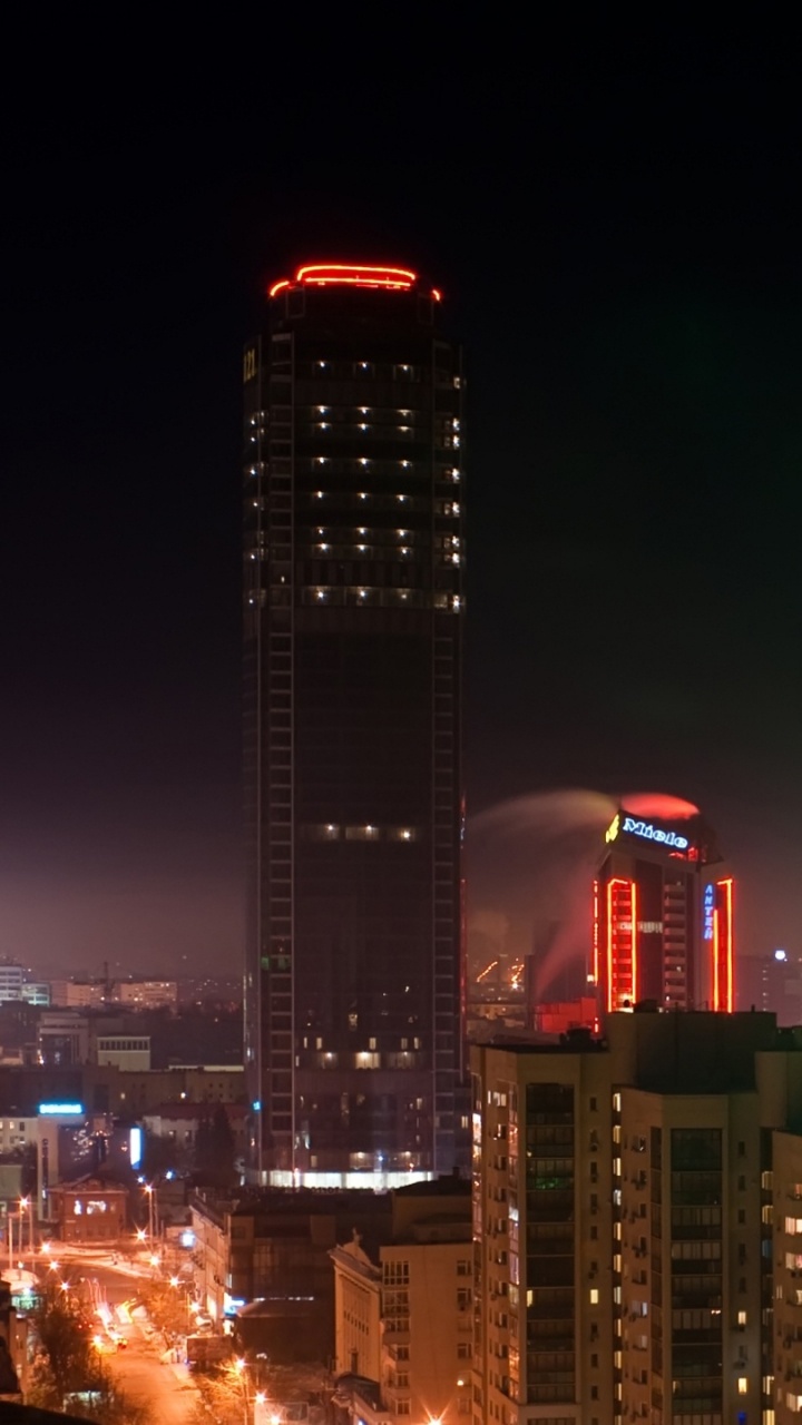 Обои небоскреб, городской район, город, городской пейзаж, ночь в разрешении 720x1280