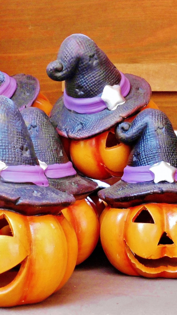 Обои Хэллоуин, улыбка, тыква, растение, пурпур в разрешении 720x1280