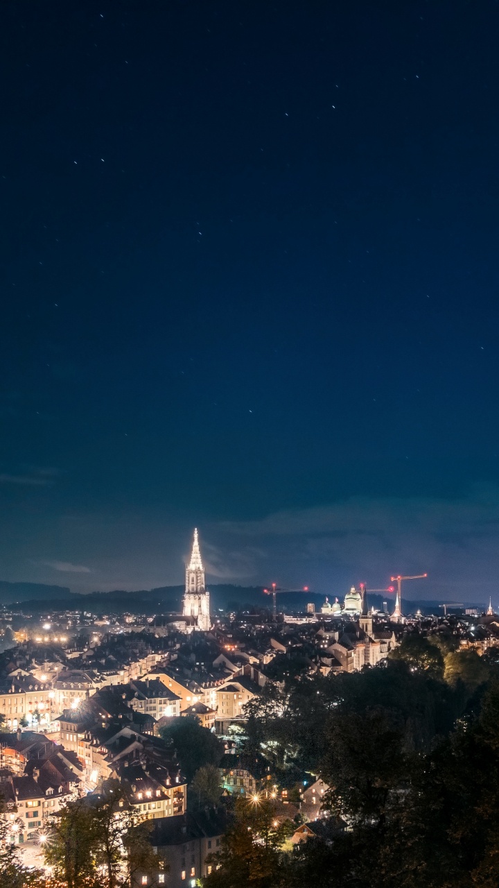 Обои ночь, город, облако, синий, городской район в разрешении 720x1280